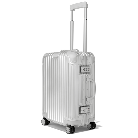 Luggage: Rimowa - Louis Vuitton - Gucci