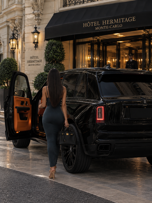 Hermès Birkin Black handbag carried outside Hôtel Hermitage Monte-Carlo